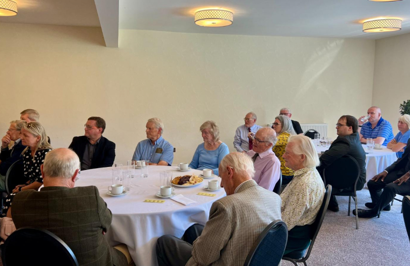 Members listen to the Secretary of State