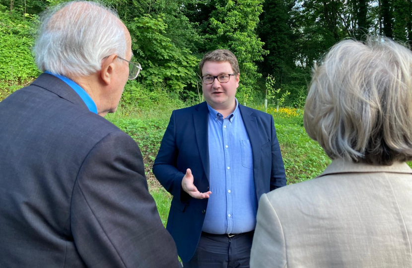 Lee in discussion with local resident